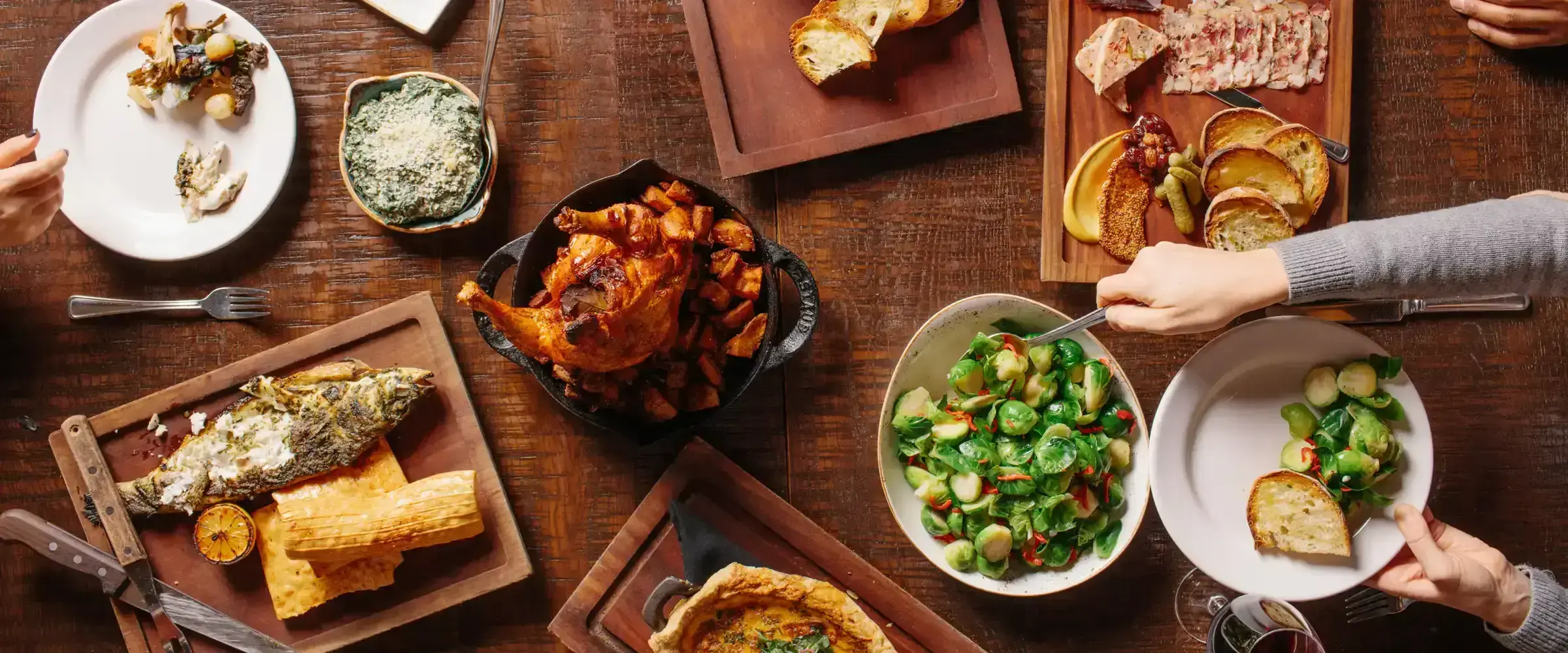 Overhead View of a full table at River Roast - desktop version