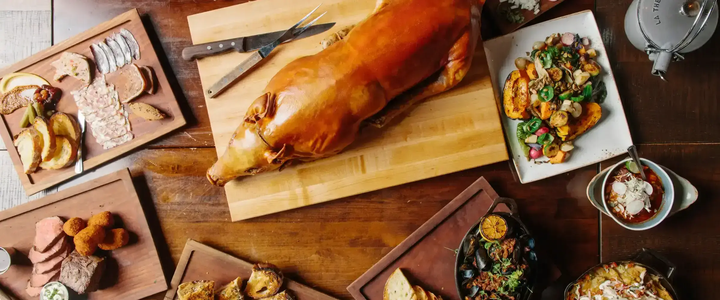 Overhead View of a full table at River Roast - desktop version