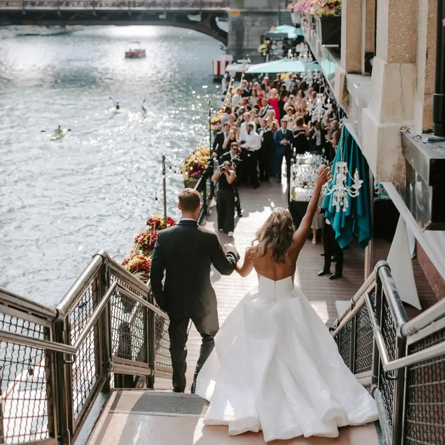 Bride and Groom walking along the Chicago Riverfront after a beautiful wedding at River Roast